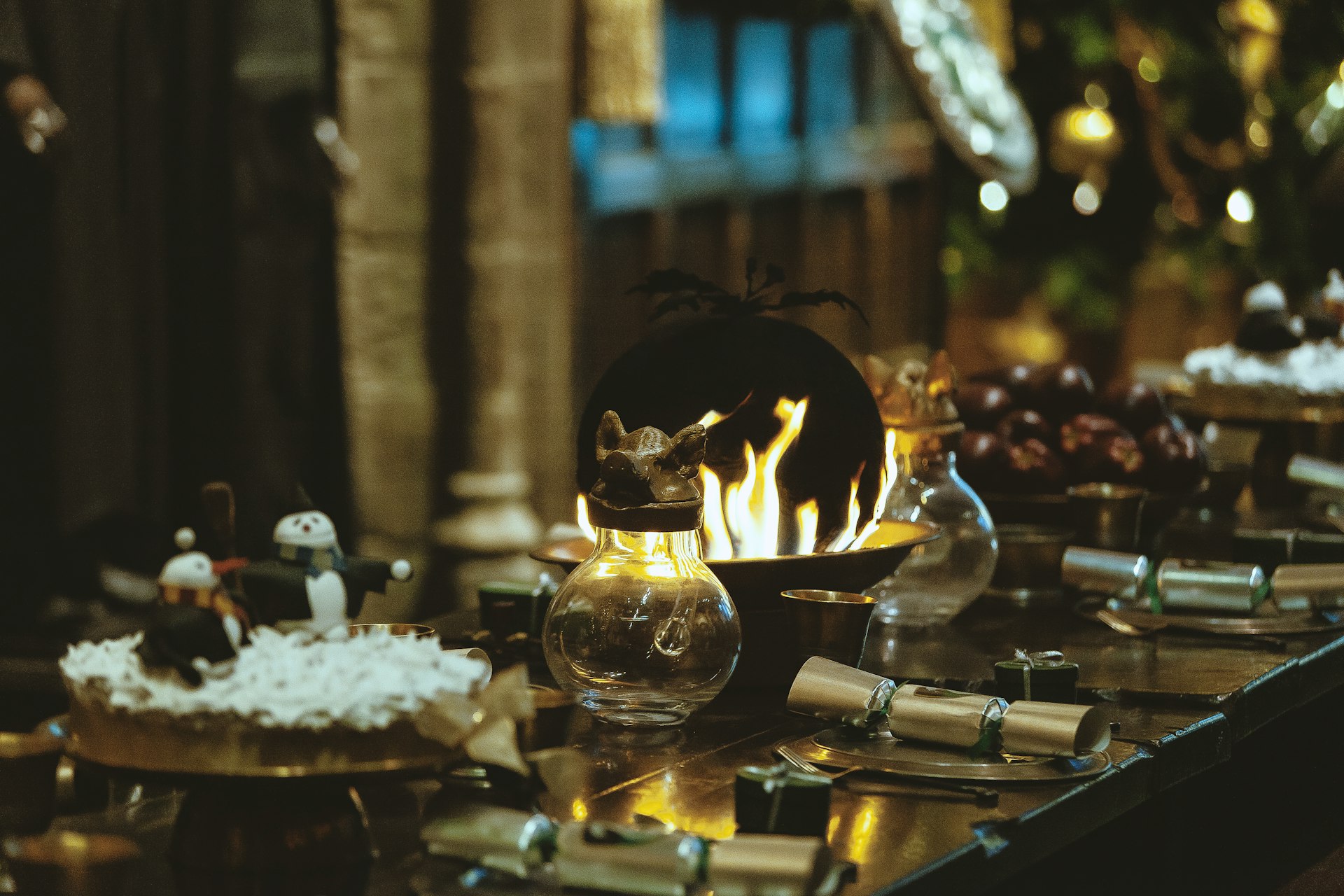 lighted candles on clear glass candle holder